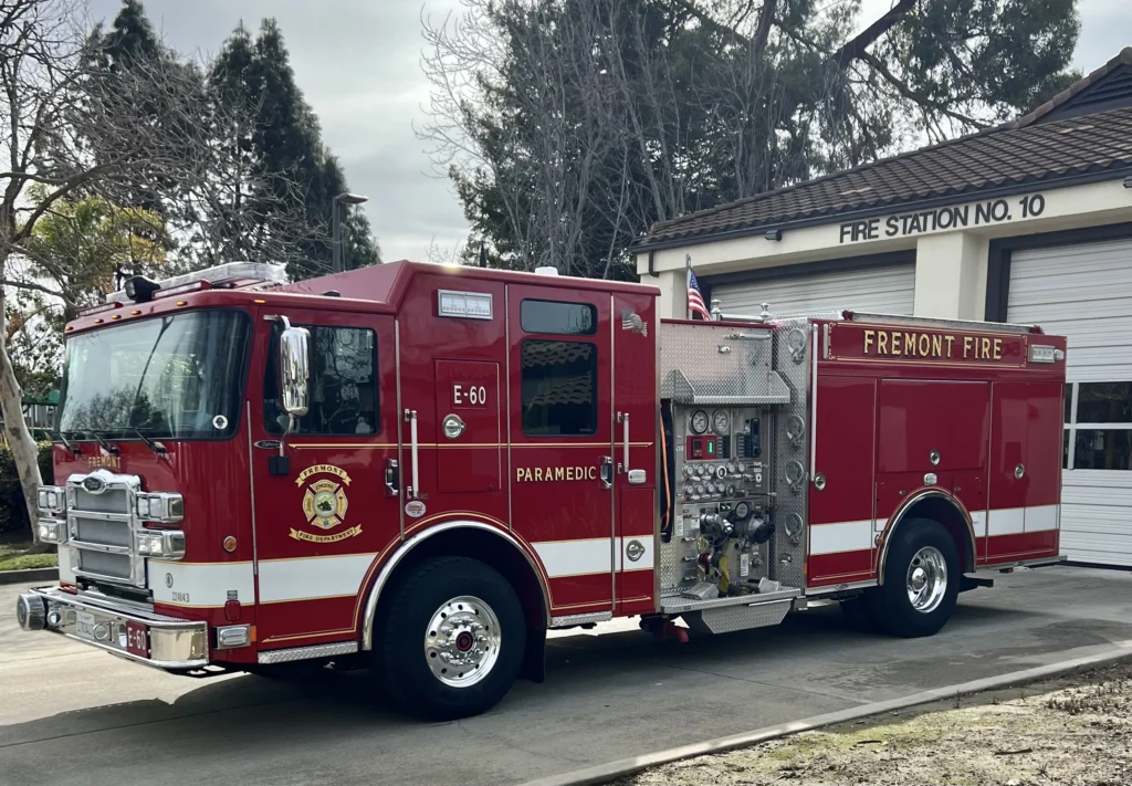 fire truck in front of the fire station