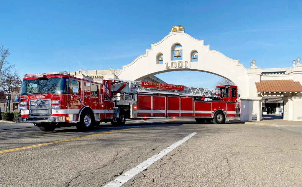 a fire truck in front of Lodi arch